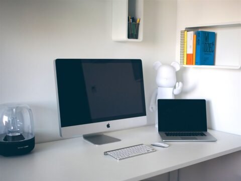 An office table with computers